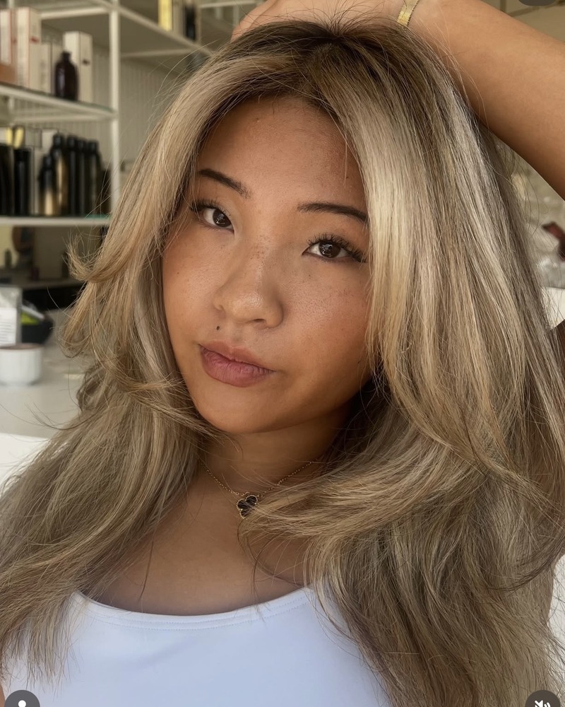 Smooth, glossy hair after a Brazilian Blowout at Rise Above Beauty Lounge in Colorado Springs