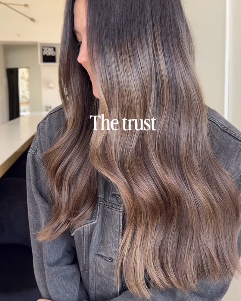 Soft gray-blended color with natural dimension at Rise Above Beauty Lounge in Colorado Springs